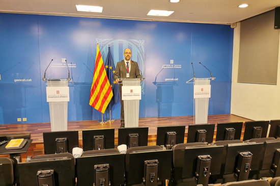 Catalan interior minister Miquel Buch speaking at a press conference on March 30, 2020 (courtesy of Catalan Government)